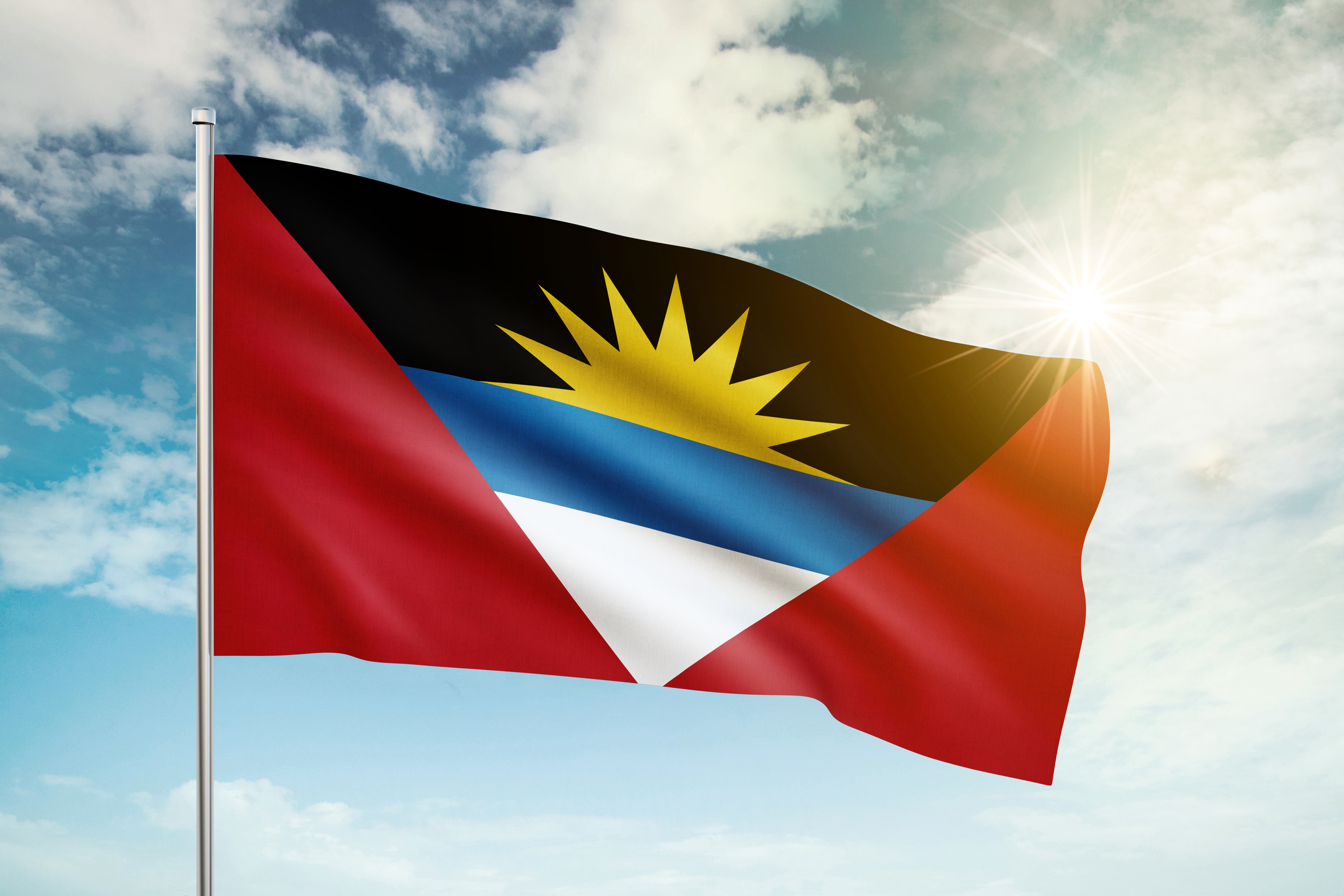 Flag of Antigua and Barbuda, which symbolizes the citizenship of the Caribbean islands