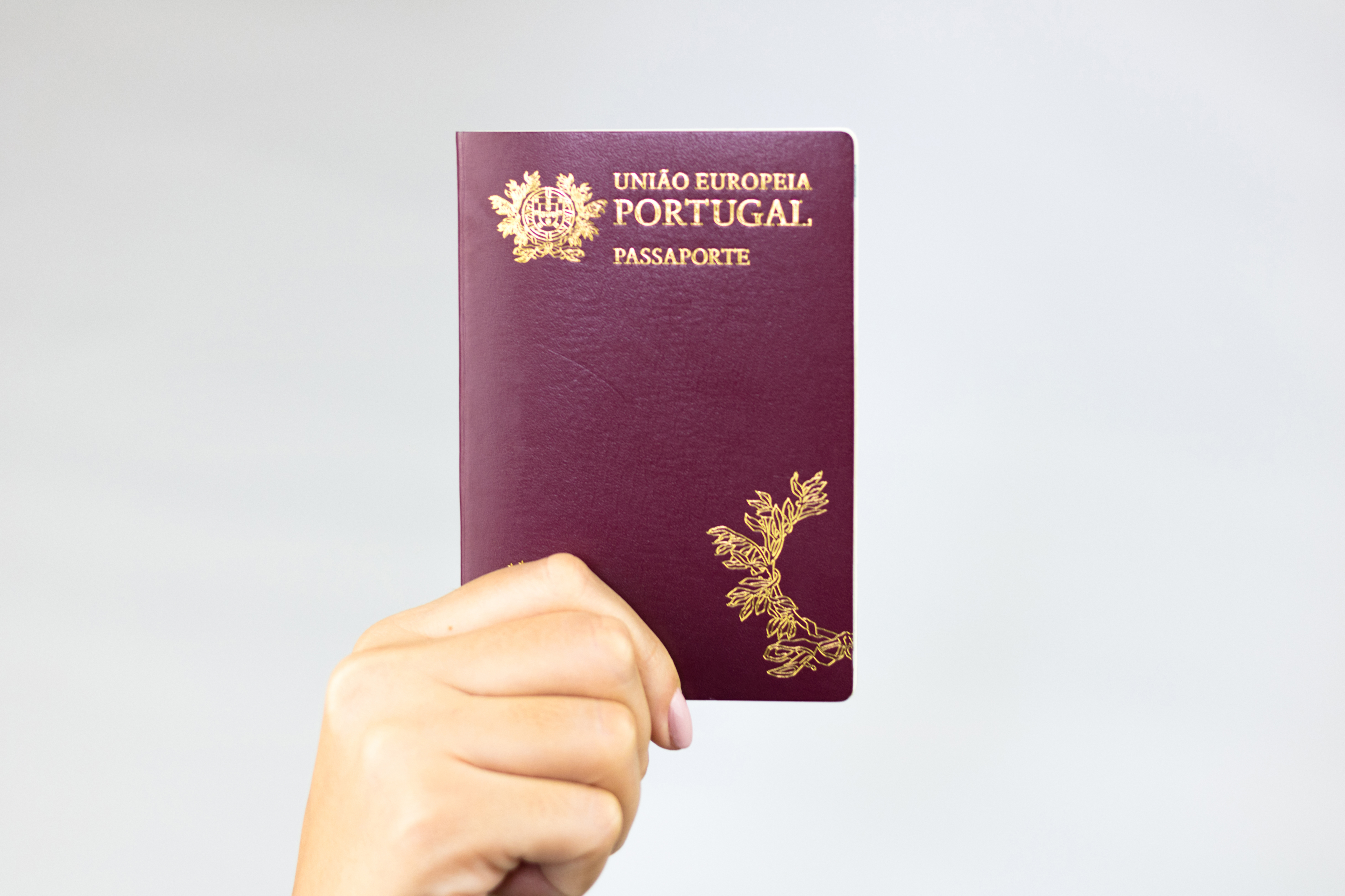 A Portuguese passport attests to the citizenship that follows a Portuguese residence permit through investment