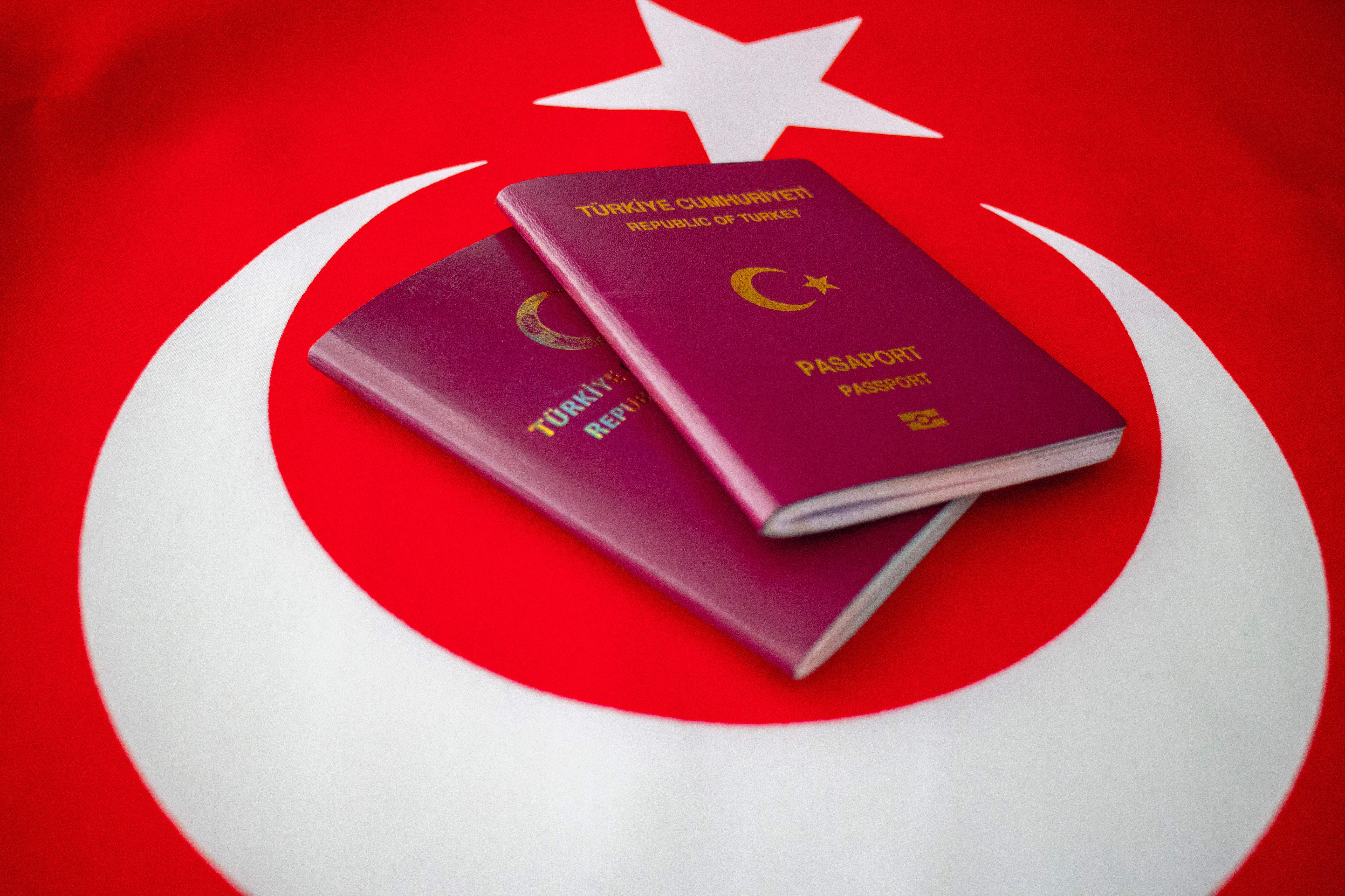 Passports on the Turkish flag symbolize Turkish citizenship by investment