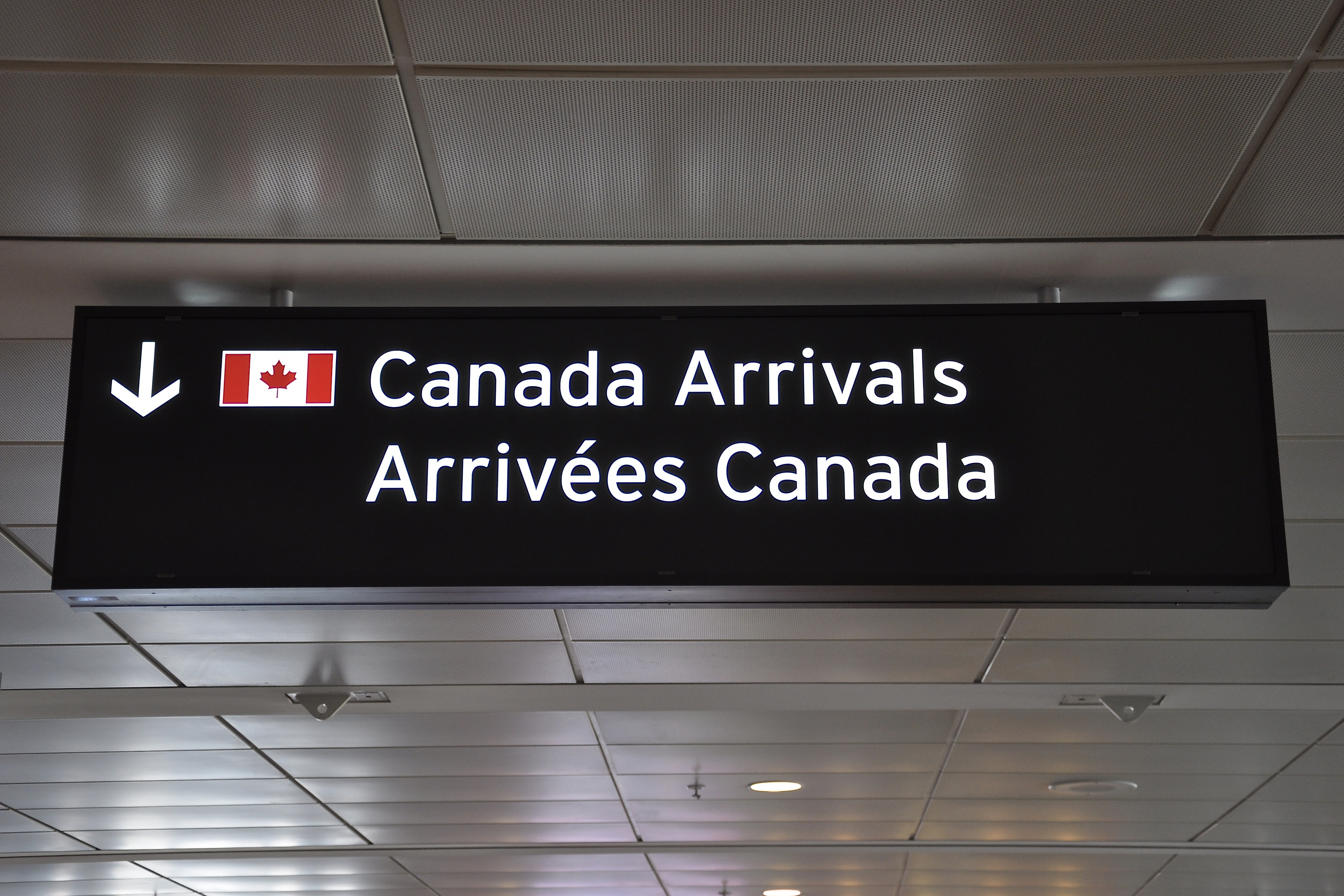 Placard at an airport in Canada, a country eligible to immigrate to through the Provincial Nominee Program