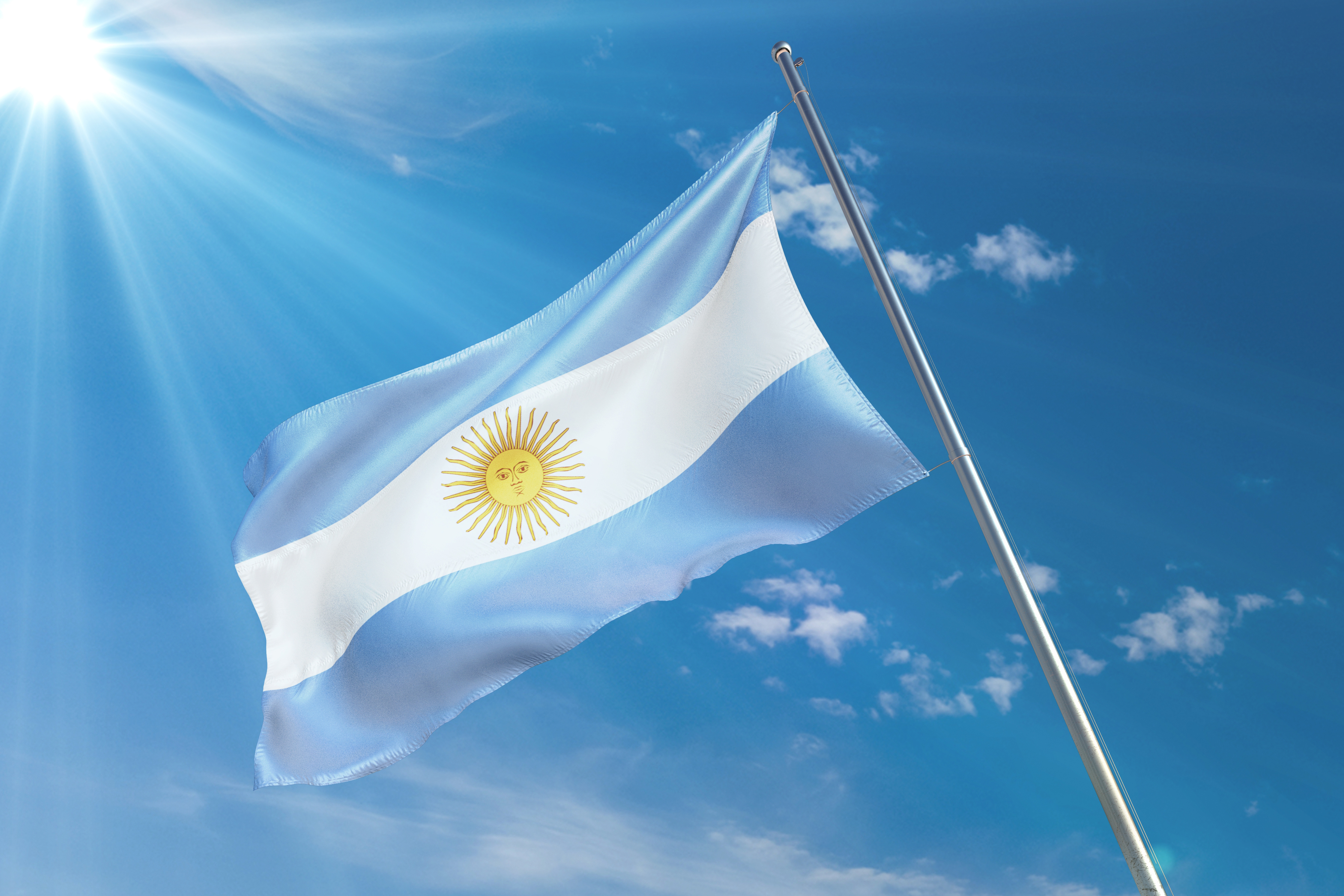 The flag symbolizes the citizenship of Argentina