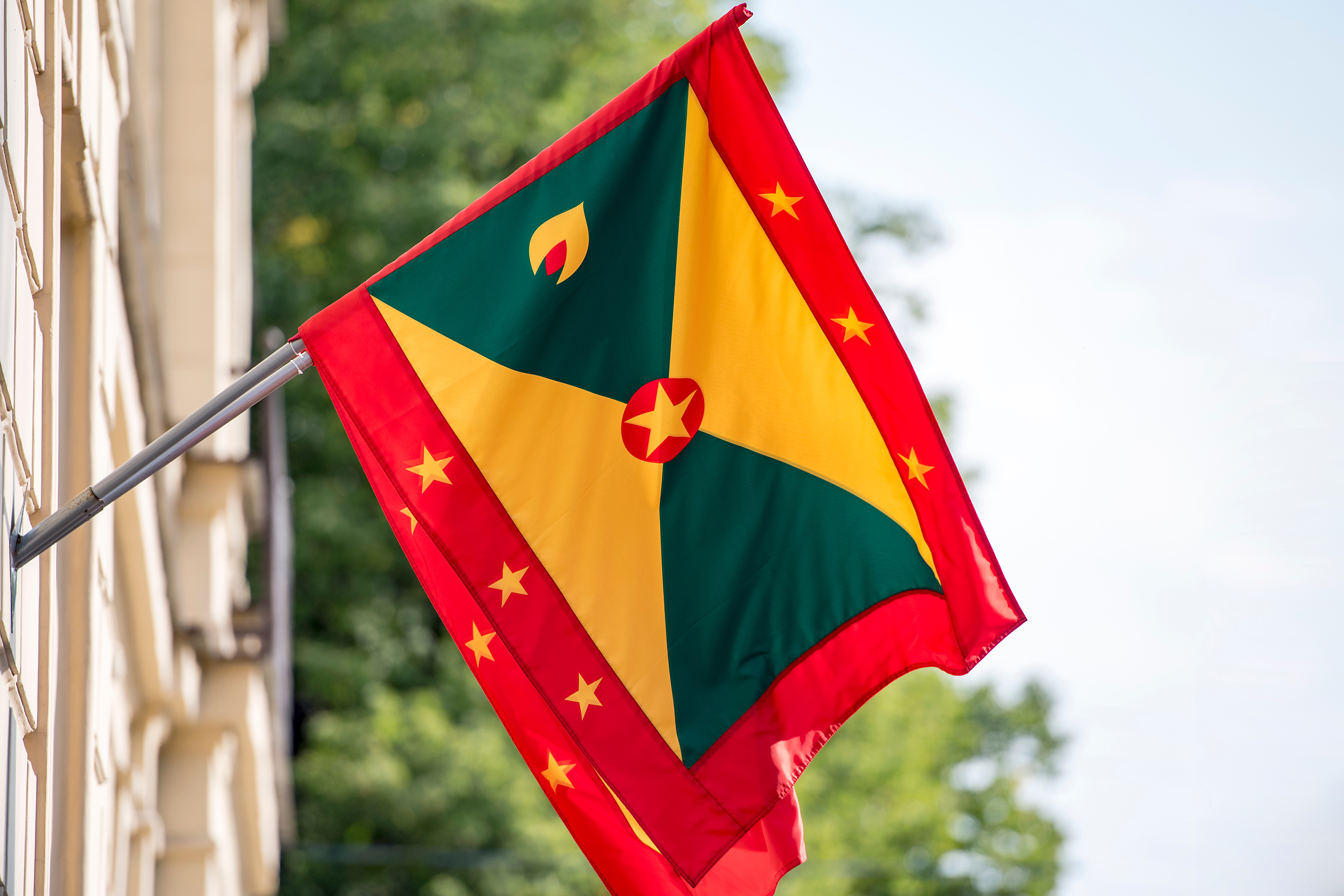 The flag symbolizes the citizenship of Grenada