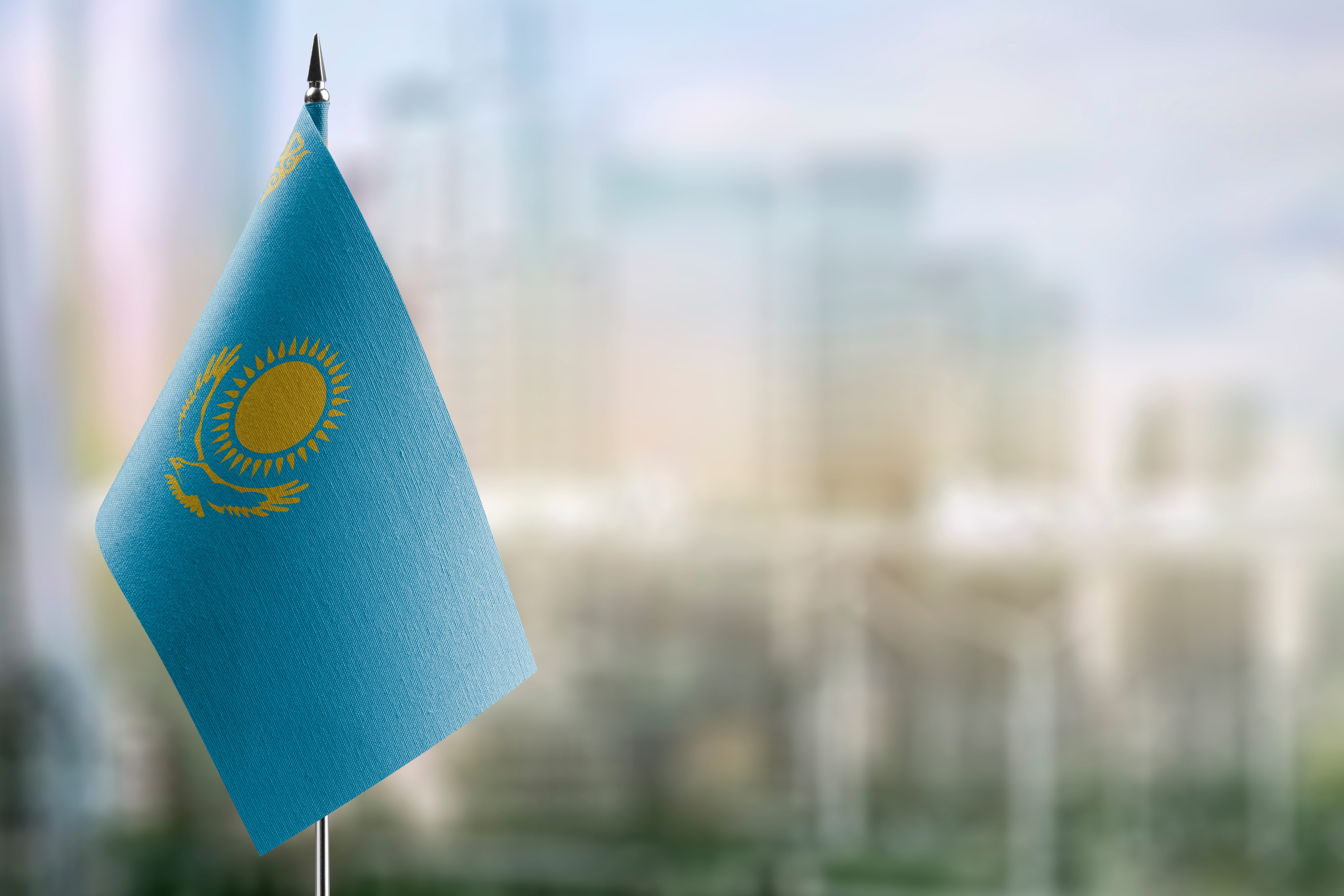 The flag symbolizes the citizenship of Kazakhstan