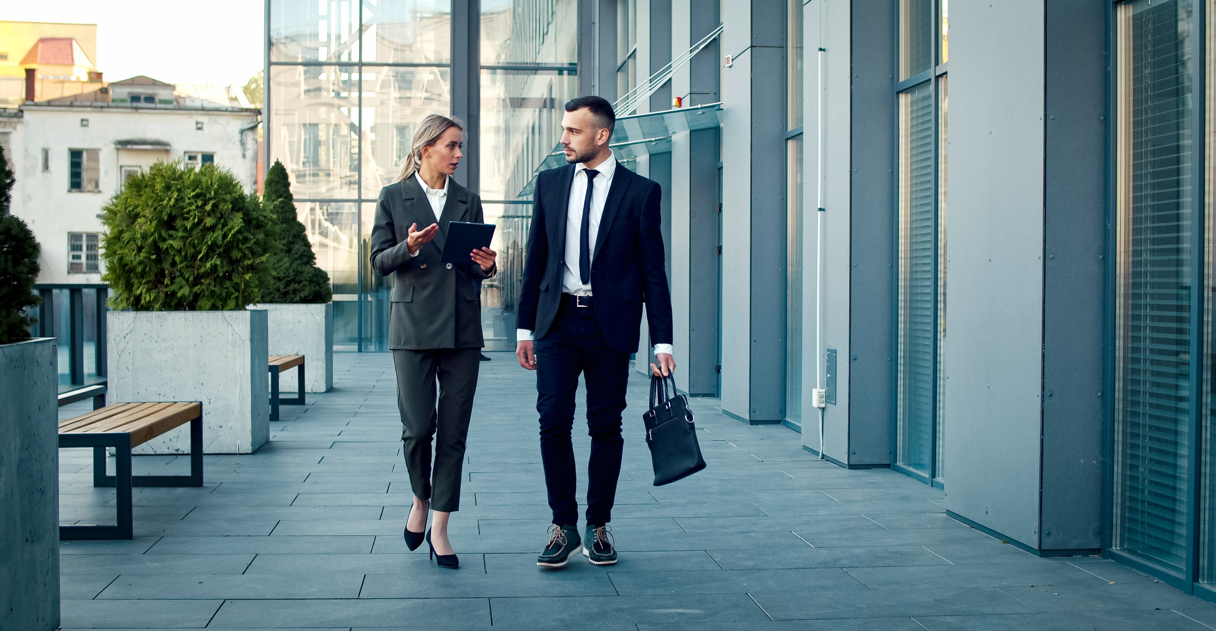 Modern glass skyscrapers viewed from below, symbolizing global business environments and international economic hubs