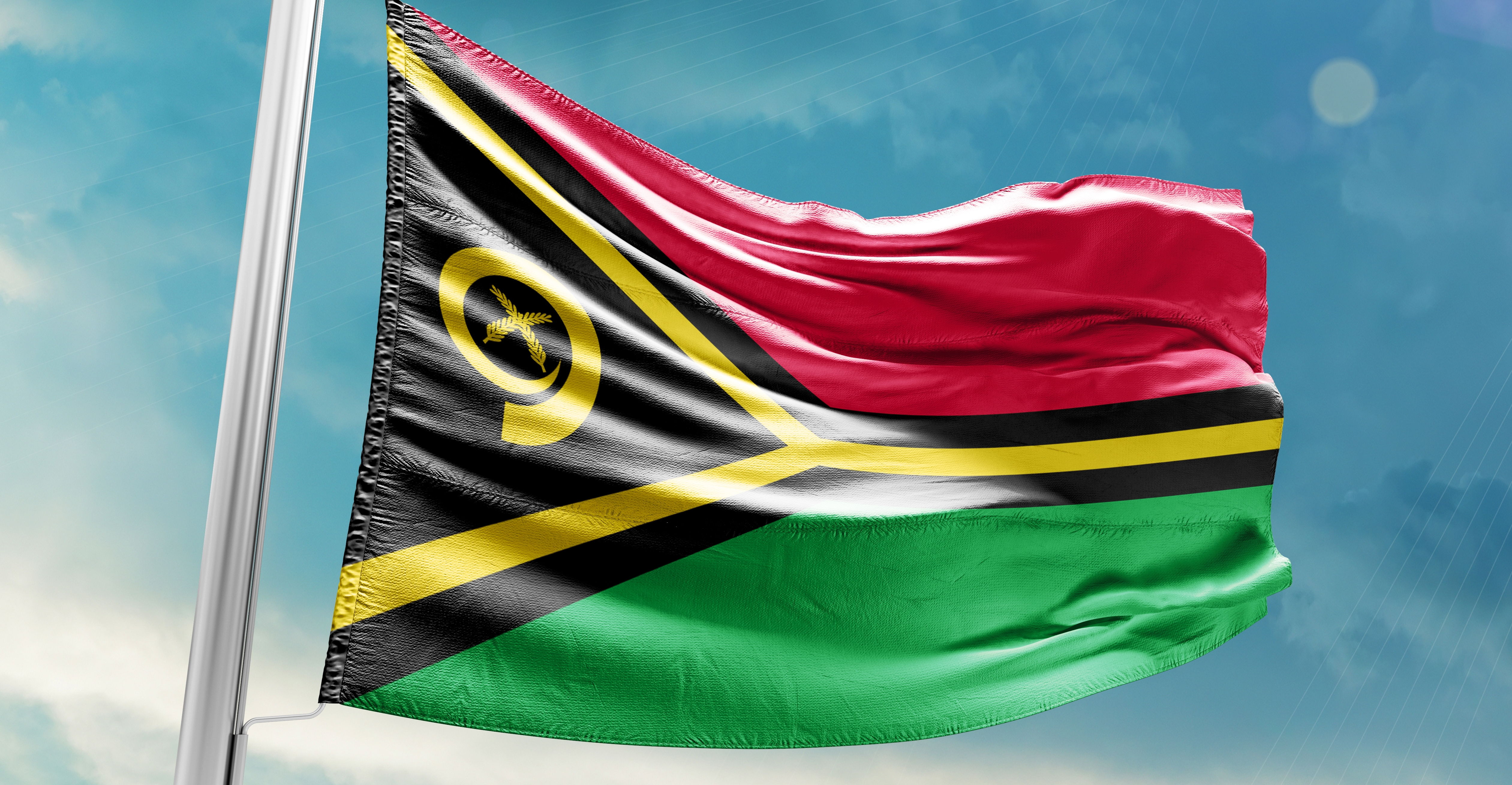 Национальный флаг республики Вануату на фоне неба