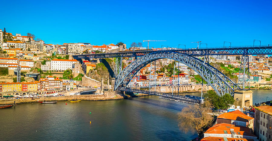 A picturesque, vibrant view of Portos Old Town on a sunny day