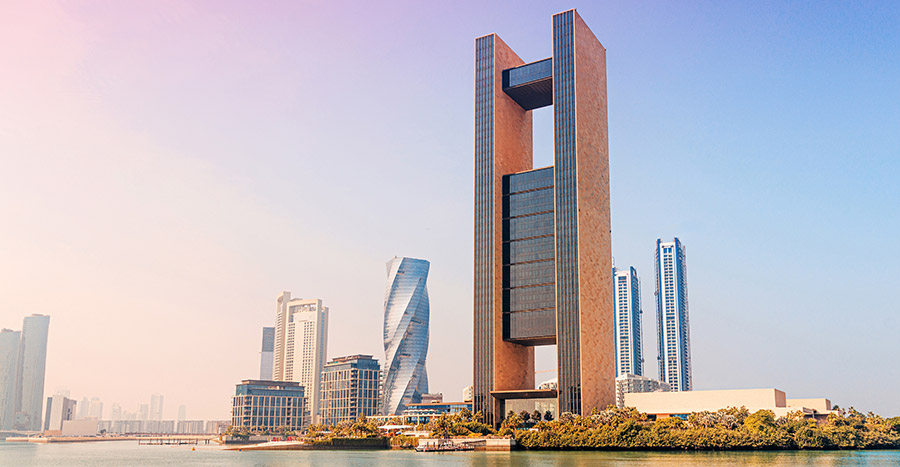 Modern waterfront skyline with high-rise office towers, illustrating the business context of opening a bank account in Bahrain
